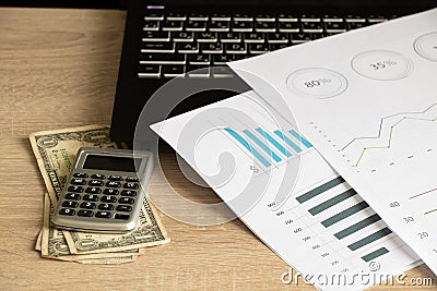 reports and histograms on paper on the table, analytics and statistics on paper, business Stock Photo