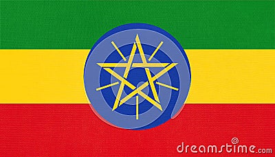 Republic of Ethiopia national fabric flag, textile background. Symbol of world African country Stock Photo