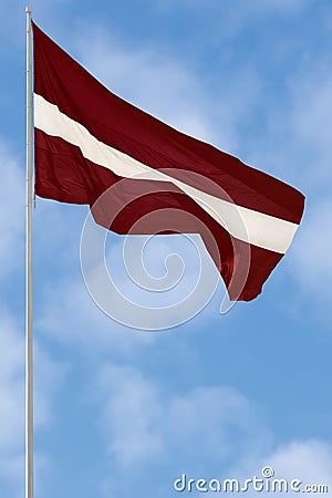Republic of Latvia state flag, Latvian national carmine red vivid crimson and white bicolour ensign, official European Union, NATO Stock Photo