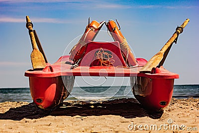 Rescue boat typically used on Italian beaches usually located near the lifeguard tower. Stock Photo