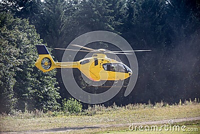 Rescue helicopter starting Stock Photo