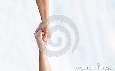 Rescue, helping gesture or hands. Two hands, helping arm of a friend, teamwork. Helping hand outstretched. Friendly Stock Photo