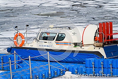 A rescue hovercraft stands at the pier. Boat to rescue those who fell through the ice Stock Photo