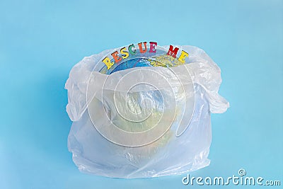 Rescue me and Model planet Earth in polyethylene plastic package Stock Photo