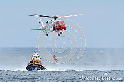 The rescue operation on sea. Coast Guard Helicopter. Editorial Stock Photo