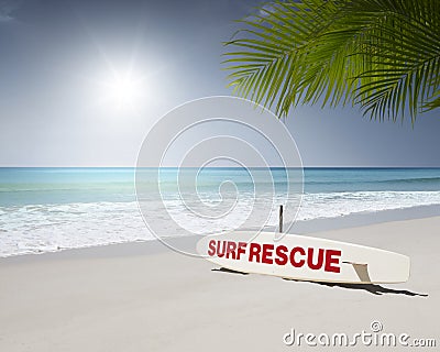 Rescue surf board on tropic beach background Stock Photo