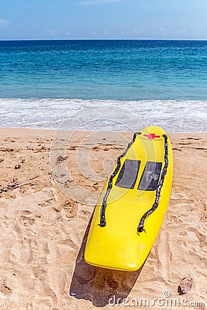 Rescue surfboard on the beach. Stock Photo