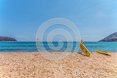 Rescue surfboard on the beach. Stock Photo