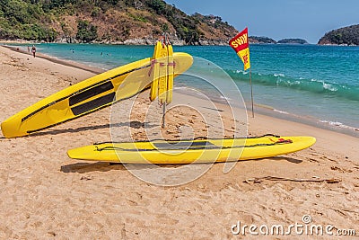 Rescue surfboard on the beach. Stock Photo