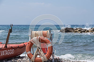Rescue tires on the beach - Italy Stock Photo