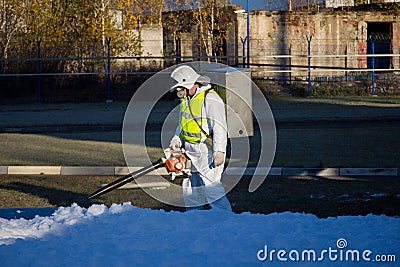 Rescuer eliminates consequences of accident, leak of chemical product elimination Stock Photo