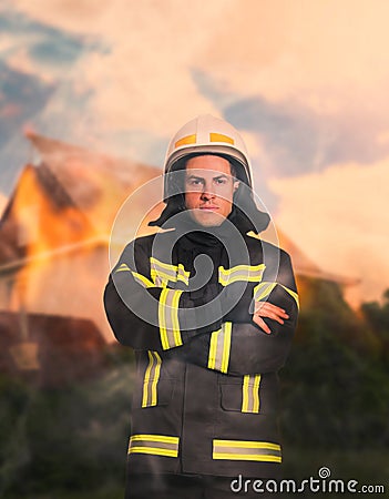 Rescuer in uniform and helmet. Professional firefighter Stock Photo