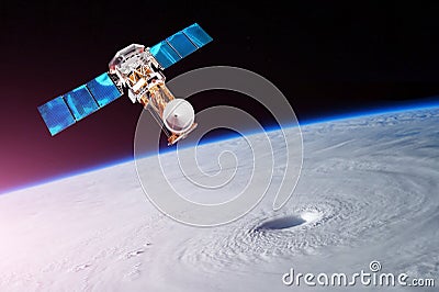 Research, probing, monitoring of tracking in a tropical storm zone, a hurricane. Satellite above the Earth makes measurements of t Stock Photo