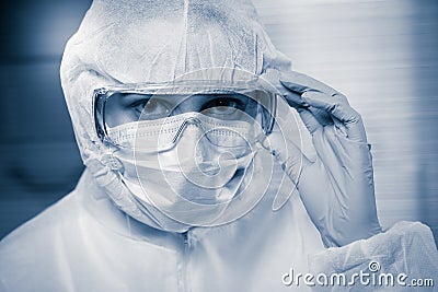 Researcher in hazmat suit Stock Photo