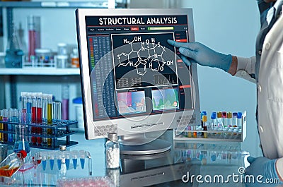Researcher touching the screen of report of structural analysis Stock Photo