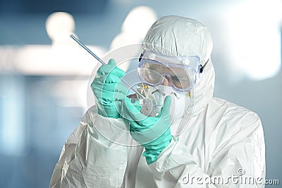 Researcher wearing a hazmat suit Stock Photo