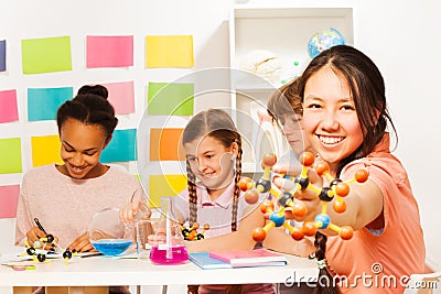 Researching chemical process with molecular model Stock Photo