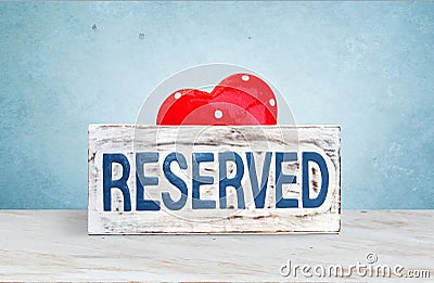 Reserve signboard and heart Stock Photo