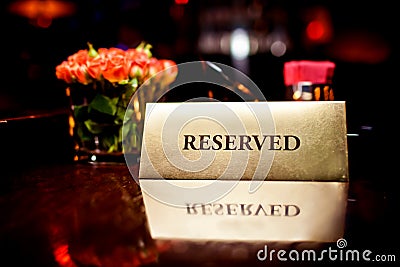 Reserved sign in restaurant Stock Photo