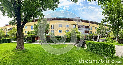Residential area with ecological and sustainable green residential buildings, low-energy houses with apartments and green Stock Photo