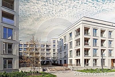 Residential area with ecological and sustainable green residential buildings, low-energy houses with apartments and green Stock Photo