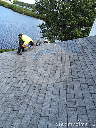 Residential Shingle Roof Repairs ; Roofer Editorial Stock Photo