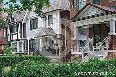 Residential street with large detached brick houses Editorial Stock Photo