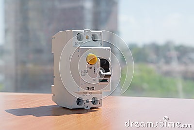 Residual current device on the table against the background of a residential building Stock Photo