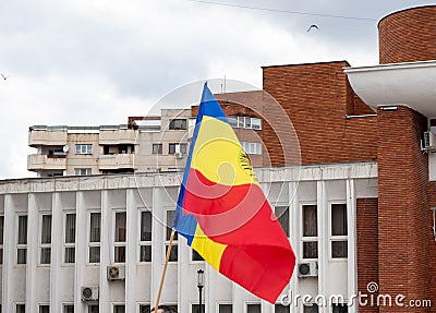 Resita, Romania-March 30, 2021: the tricolor flag of Romania photographed at the protest against restrictive measures, in the Editorial Stock Photo