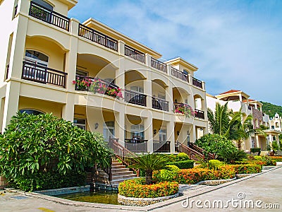 Resort house with beautiful flowerbeds Stock Photo