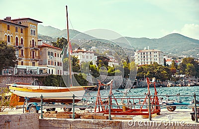 Resort town Lovran, Croatia. Boat at piers Stock Photo