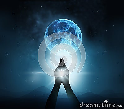 Respect and pray on blue full moon with nature background Stock Photo