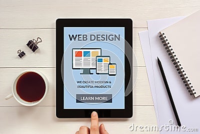 Responsive web design concept on tablet screen with office objects Stock Photo