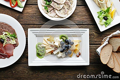 Restaraunt food - cheese plate with grape Stock Photo