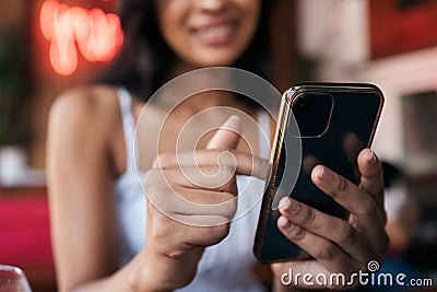 Restaurant, bar and smartphone in hands of woman for social networking, mobile chat app and internet scroll, surfing or Stock Photo