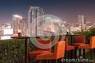 Restaurant dining table and view of business building on terrace Stock Photo