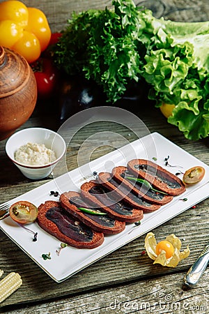 Azerbaijani basturma with sliced spices Stock Photo