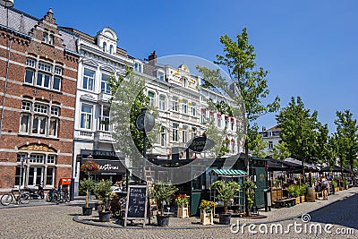 Restaurant and flower shop in the Wyck neighbourhood of Maastricht Editorial Stock Photo