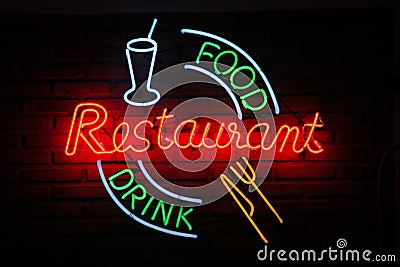 Retro Restaurant food drink neon wall sign background Stock Photo