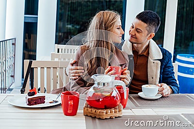 Restaurant. a guy with a girl drink hot coffee and tea Stock Photo