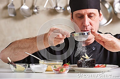 Restaurant hotel private chef preparing dessert chocolate cake Stock Photo