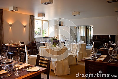 Restaurant interior with served tables Stock Photo