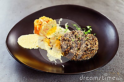 Restaurant presentation of cooked haggis Stock Photo