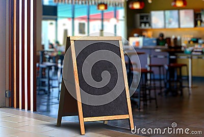 Restaurant sidewalk chalkboard sign board stand Stock Photo