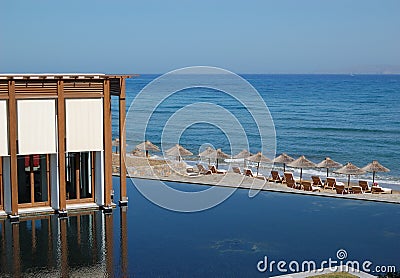 Restaurant, swimming pool and beach Stock Photo