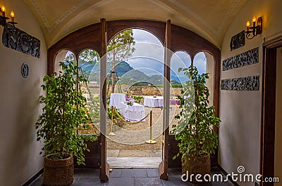 Restaurant tables in the yard of castle Brown in Portofino, Liguria, Italy Stock Photo