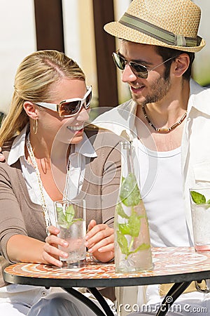 Restaurant terrace elegant couple drink sunny day Stock Photo