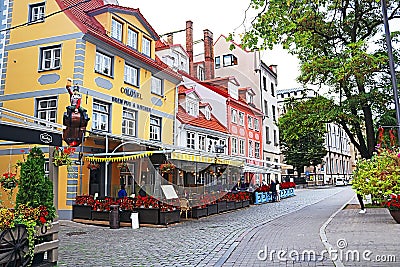 Restaurants and colorful buildings on Meistaru Street in Old town, Riga Editorial Stock Photo