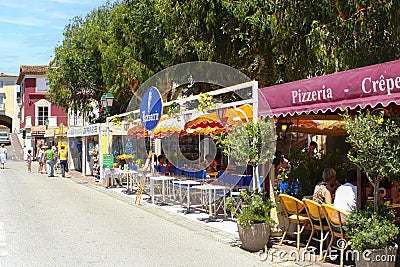 Restaurants and Pizzeria in a French picturesque small town in the Provence-Alpes-CÃ´te d'Azur region Editorial Stock Photo