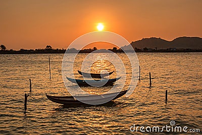 Resting Boats at Dusk at Nai Lagoon Stock Photo